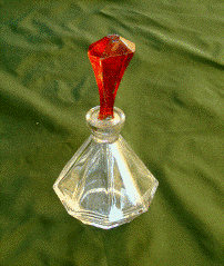 Flacon, bouchon rouge